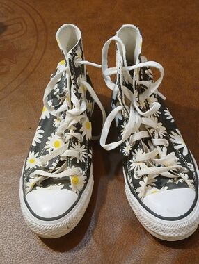 Converse Black High-Top Sneakers with White and Yellow Daisy Print